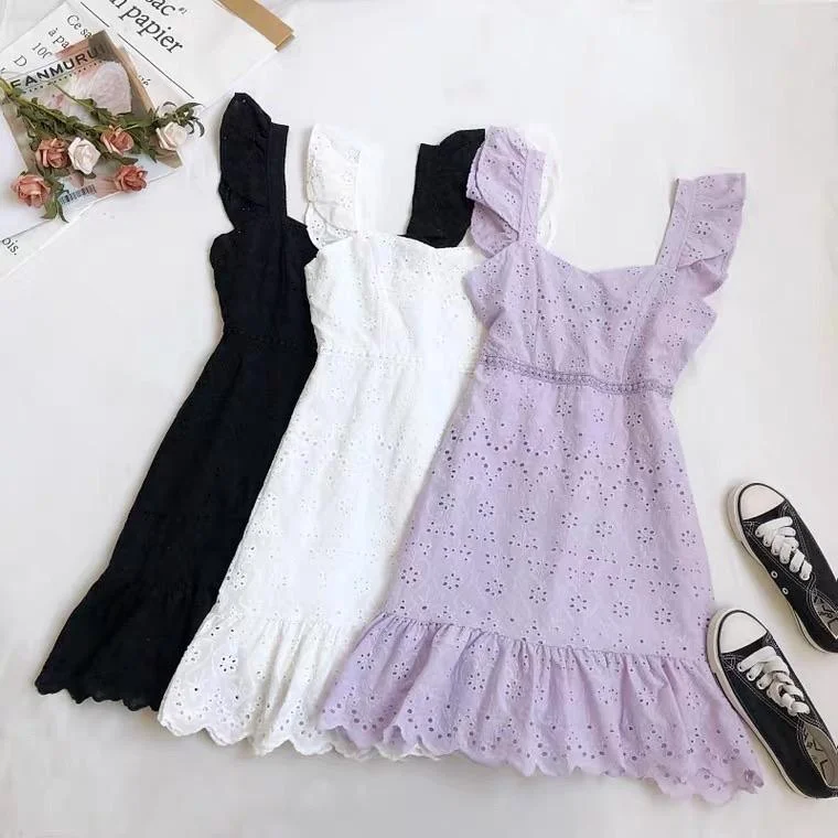 Mini dresses with pleated skirts for a classic look Mykonos Eyelet Dress