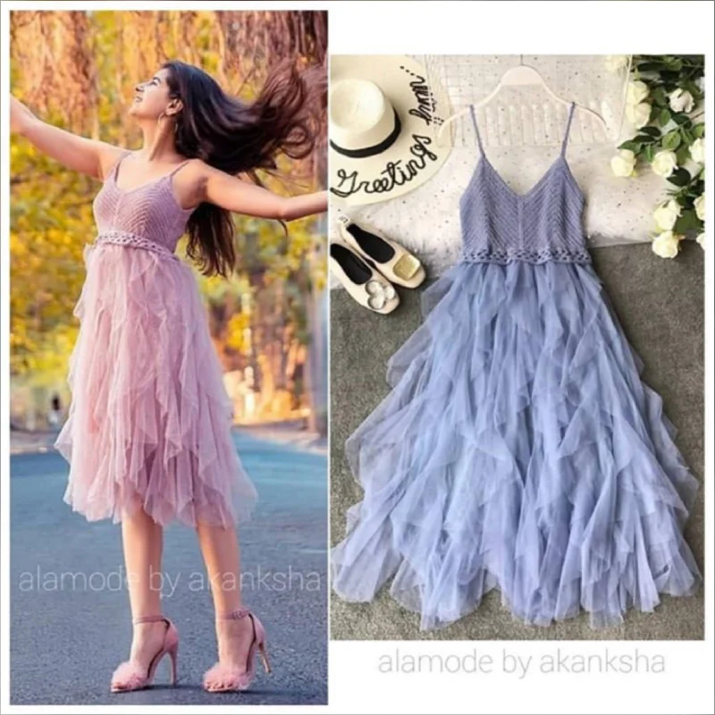 Midi dresses with ruffled sleeves for a more feminine and voluminous look Serena Inox Midi Dress