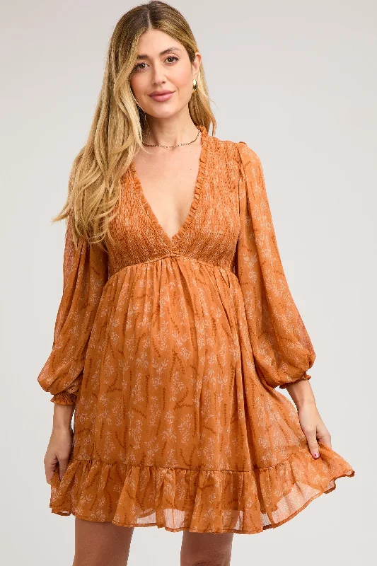 Printed Abstract Women Dress for a Modern and Artistic Appeal Printed Abstract Women Dress for a Modern and Artistic Appeal Orange Floral Smocked Long Sleeve Maternity Dress