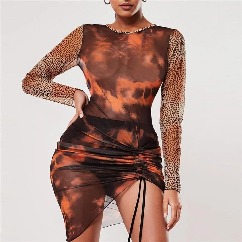 Printed Abstract Women Dress for a Modern and Artistic Appeal Printed Abstract Women Dress for a Modern and Artistic Appeal FashionSierra - Transparent Mesh Long Sleeve Dress Women Lirregular Lace Up Mini Party Dress O Neck Club Nightwear Vestidos De Verano