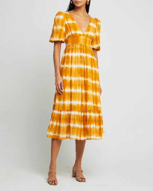 Maxi - inspired midi dresses with flowing fabrics for a beachy vibeAramina Dress