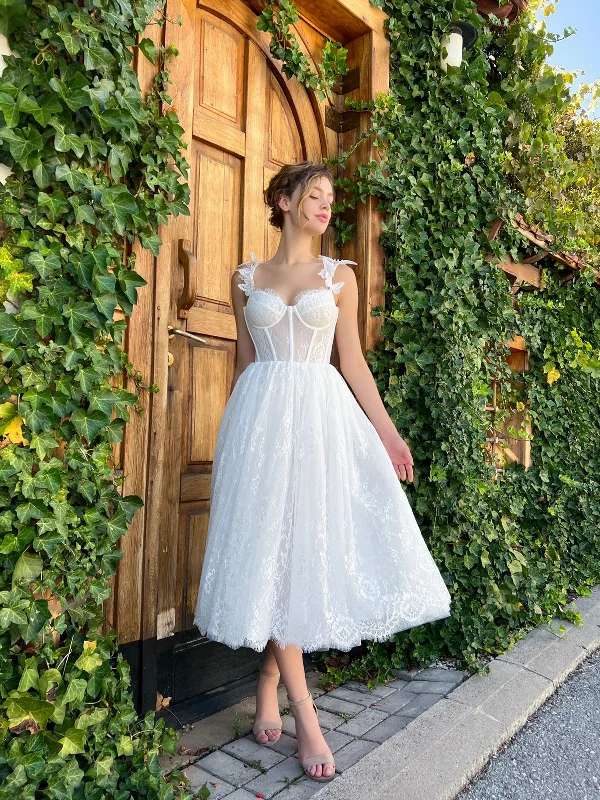 Midi dresses with tiered skirts for a bohemian festival lookButterfly Flutter Midi Dress