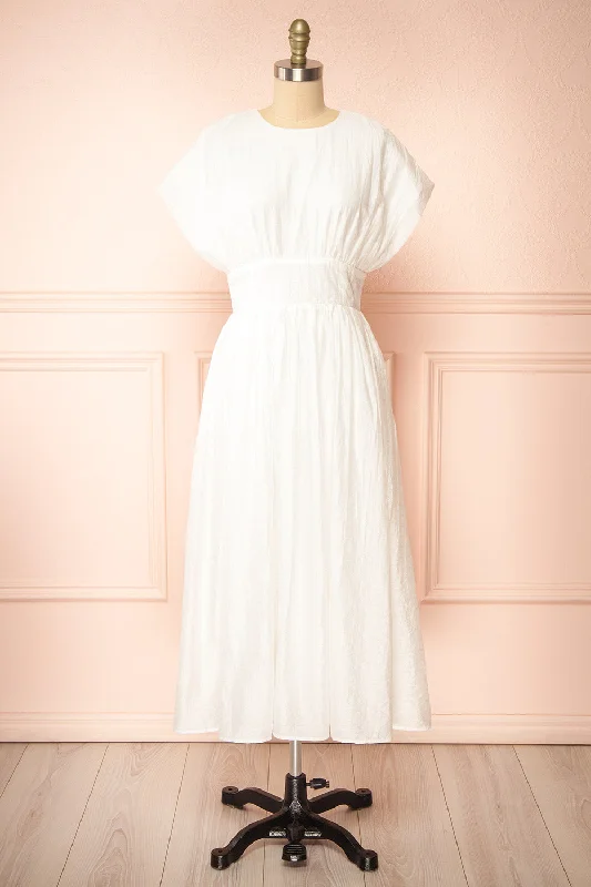 Midi dresses with tiered skirts for a bohemian festival lookEvitae | White Midi Dress w/ Short Sleeves