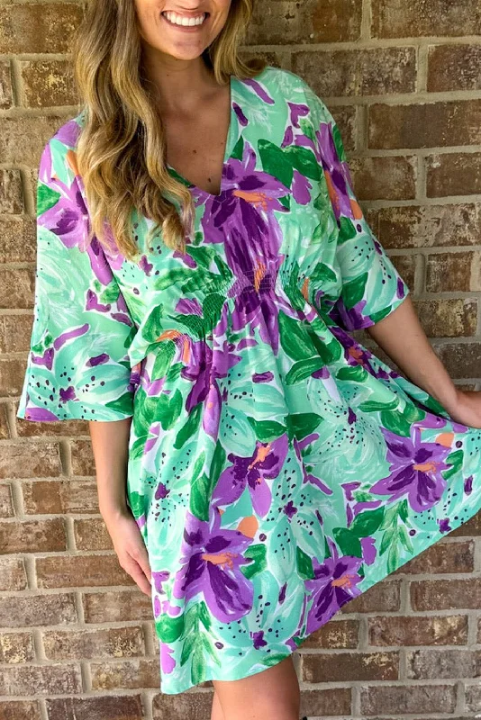 Midi dresses with tiered skirts for a bohemian festival lookFloral 3/4 Sleeve V-Neck Mini Dress