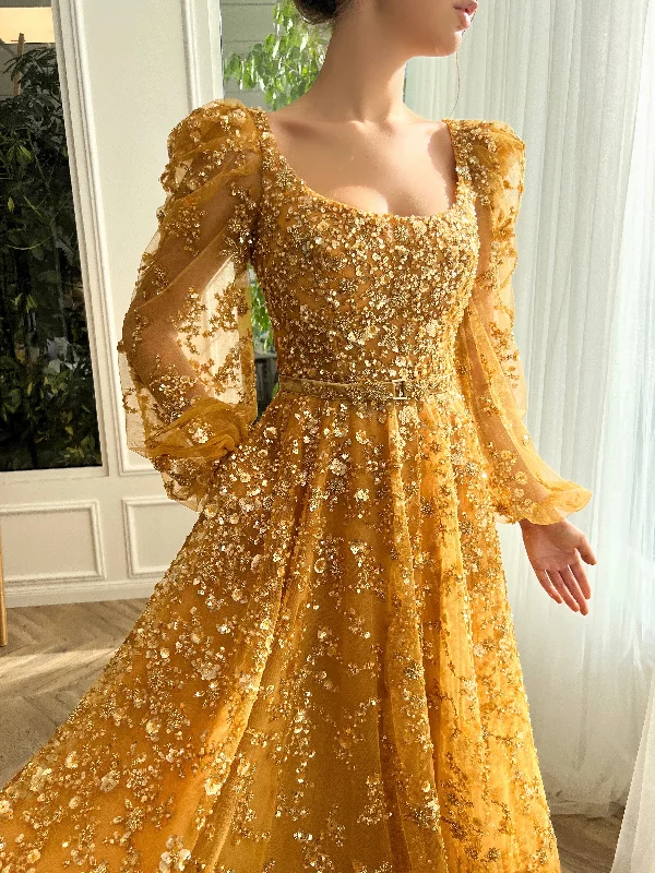 Midi dresses with ruffled bodices for a more pronounced feminine lookMarigold Reverie Gown