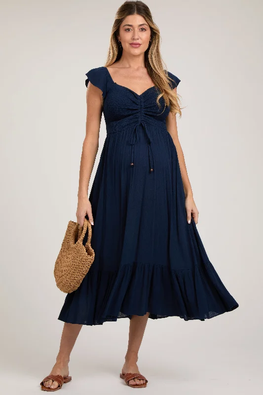 Sleeveless midi dresses with lace details for summer weddingsNavy Smocked Ruched Ruffle Hem Maternity Maxi Dress
