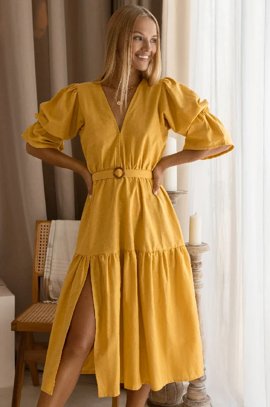 Midi dresses with ruffled bodices for a more pronounced feminine lookPeony Midi Dress