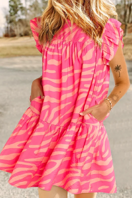 Midi dresses with pleated skirts for a timeless and elegant appealZebra Ruffle Pocketed Dress