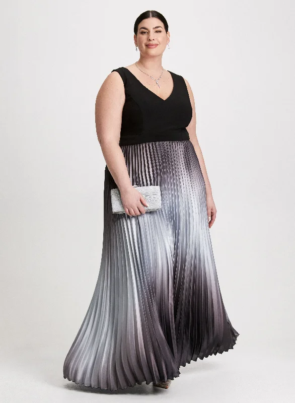 Midi dresses with keyhole backs for a flirty and unexpected detailSleeveless V-Neck Pleated Dress