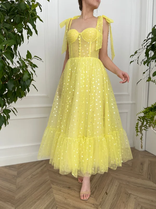 Midi dresses with keyhole backs for a flirty and unexpected detailYellow Brick Road Ruffle Midi Dress