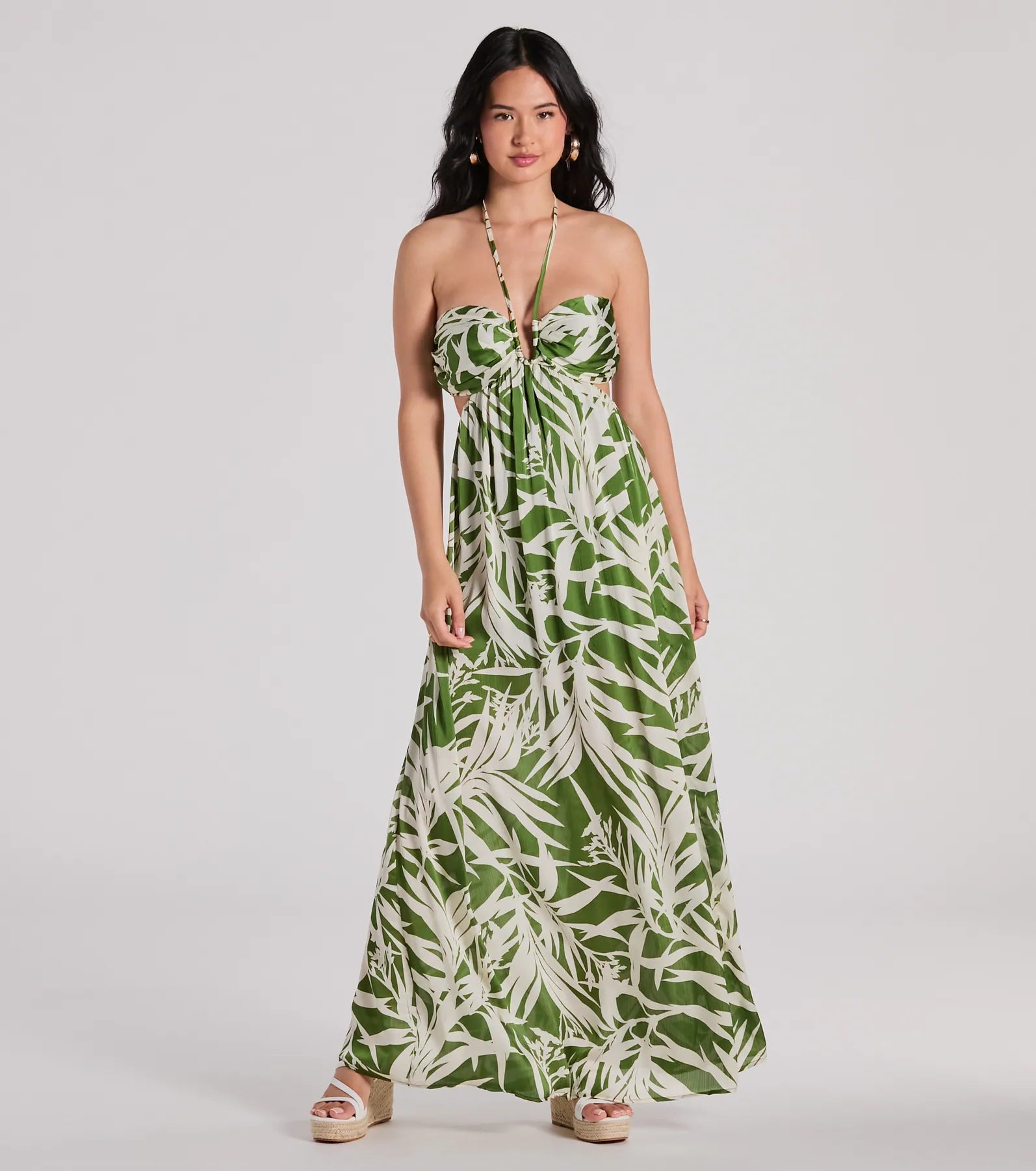 Maxi dresses with tassel accents for a fun and lively touchBright Beauty Halter Cutout Tropical Maxi Dress