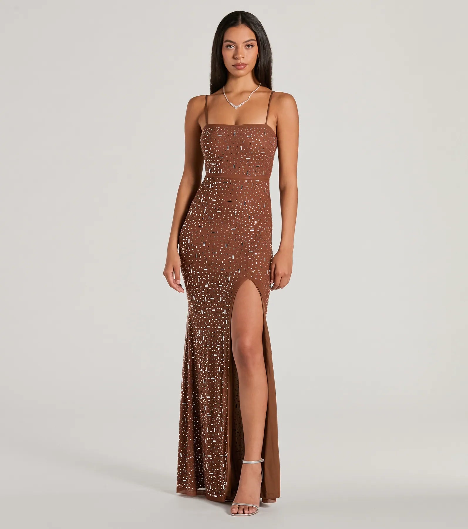 Leather maxi dresses for an edgy and bold appearanceBritt Sleeveless Mermaid Rhinestone Formal Dress