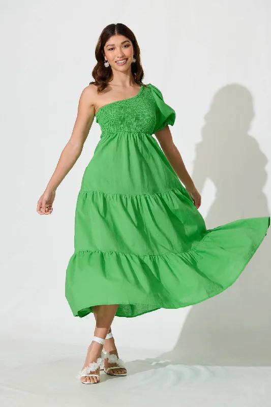 Maxi dresses with thin spaghetti straps for a delicate and feminine feelElyria Maxi Dress In Green Cotton Linen Blend