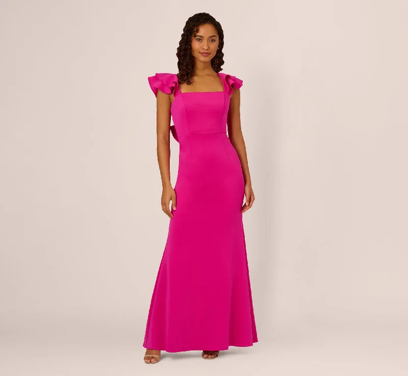 Linen maxi dresses for a breathable and lightweight summer optionFlutter Sleeve Mermaid Gown In Fuchsia