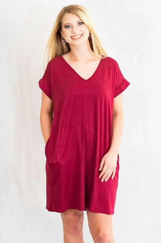 Mini dresses with asymmetric hems for a fashion - forward lookCuffed Sleeve V-Neck T-Shirt Dress with Pockets by Entro