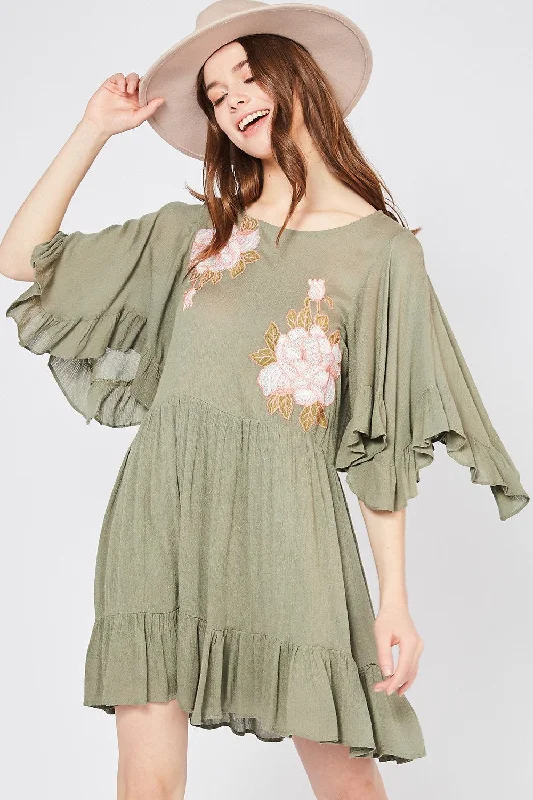 Mini dresses with abstract prints for an artistic lookFloral Embroidered Boho Ruffle Hem Dress by Entro
