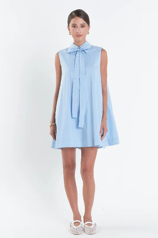 Mini dresses with abstract prints for an artistic lookSleeveless Bow Shirt Dress