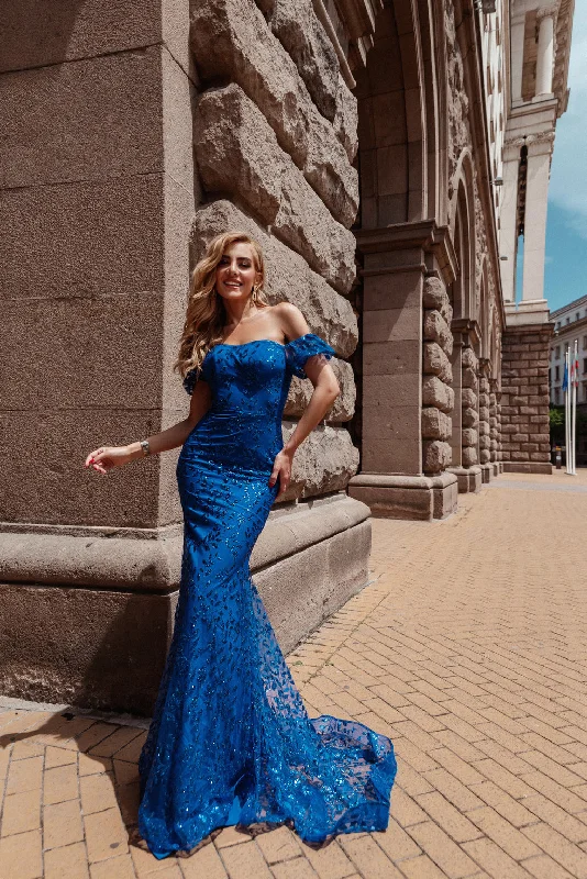 Ruffled maxi dresses with a tiered skirt for added volume Ruffled maxi dresses with a tiered skirt for added volume Tina Holly TW024 Long Mermaid Glitter Formal Prom Dress