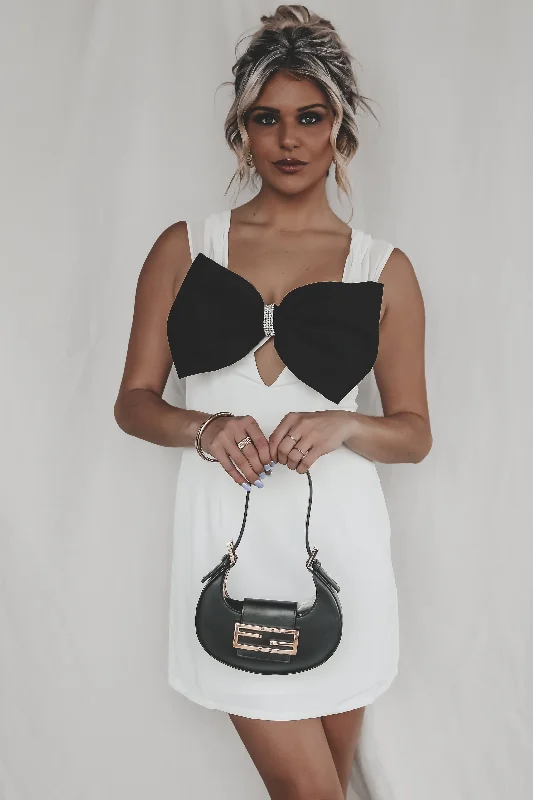 Mini dresses with fringe for a bohemian styleElegant Is My Middle Name White Bow Mini Dress