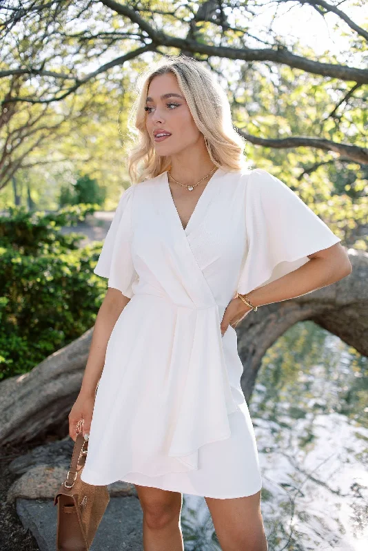 Printed mini dresses for a casual day outWhite Short Sleeve Wrapped Mini Dress - FINAL SALE
