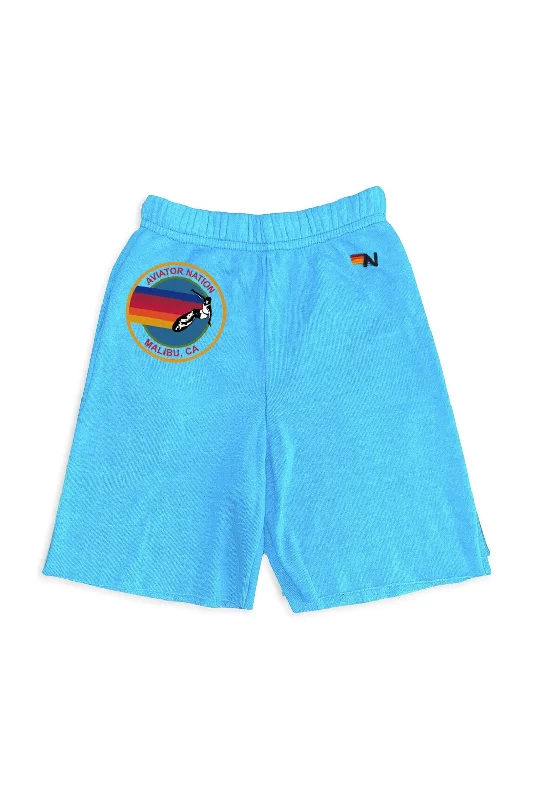 Solid Color Women Shorts in Bright Hues for a Bold StatementAVIATOR NATION MALIBU KIDS SWEATSHORTS - NEON BLUE