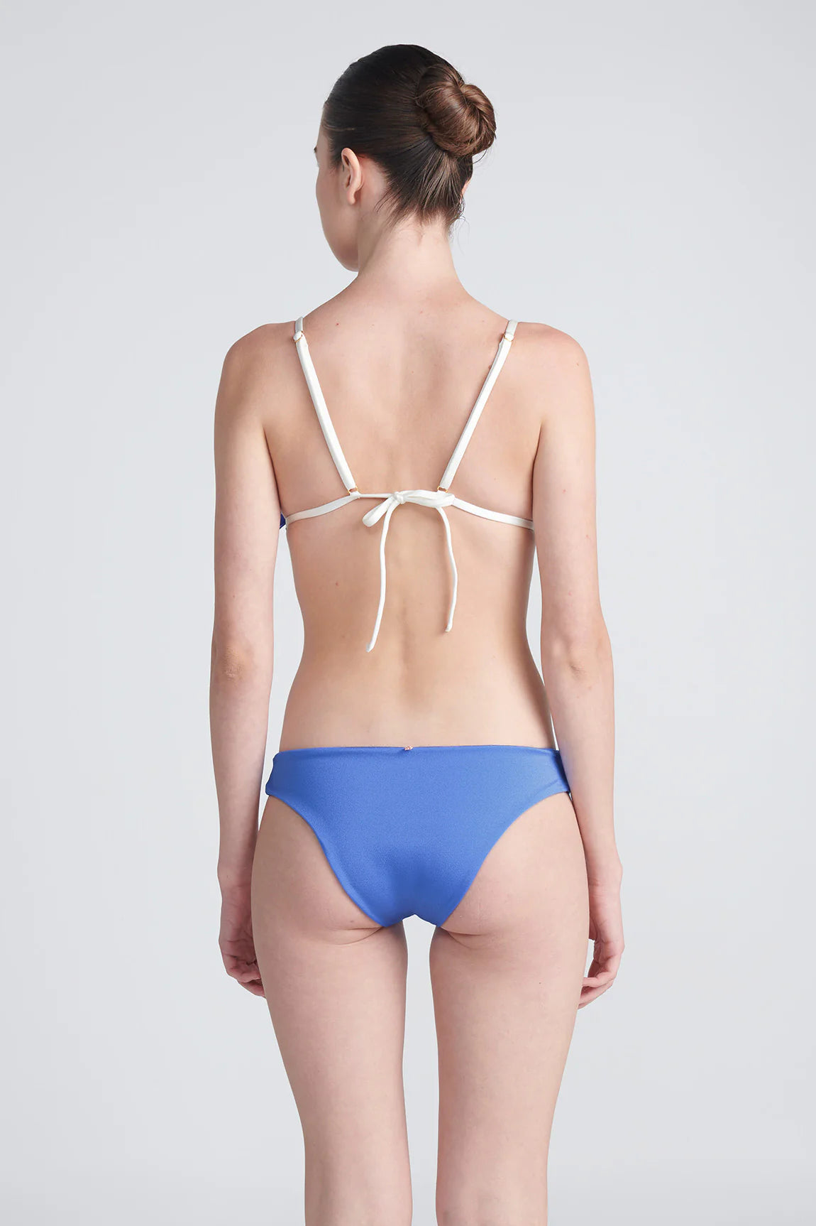 Long - line bikini top for added support and a fashionable lookBottom Dichotomy Blue