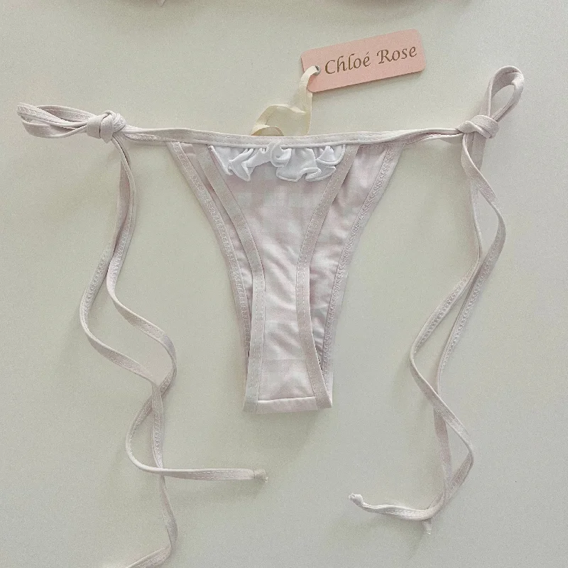 String bikini for a minimalistic and sexy beach styleButtercup Thong Bottom (Ballet Slipper Pink)